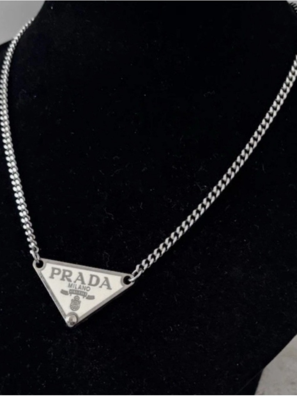 Prada White Pendant and
Chain